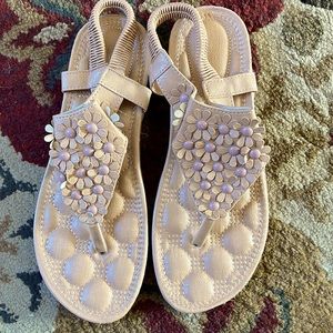 3/$13 Beige thong sandals w/elastic heel strap.